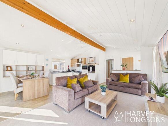 Open plan lounge and kitchen area inside Cambrian 