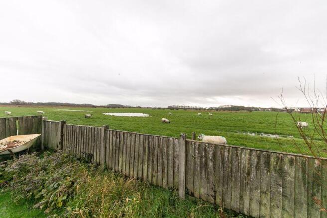 Open farmland to rear