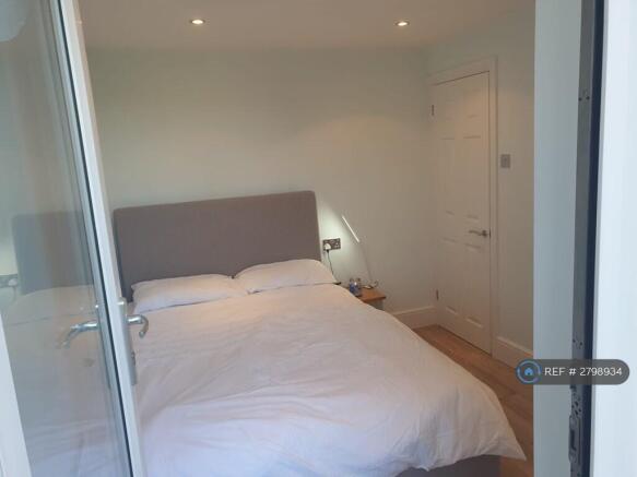 Bedroom With Balcony
