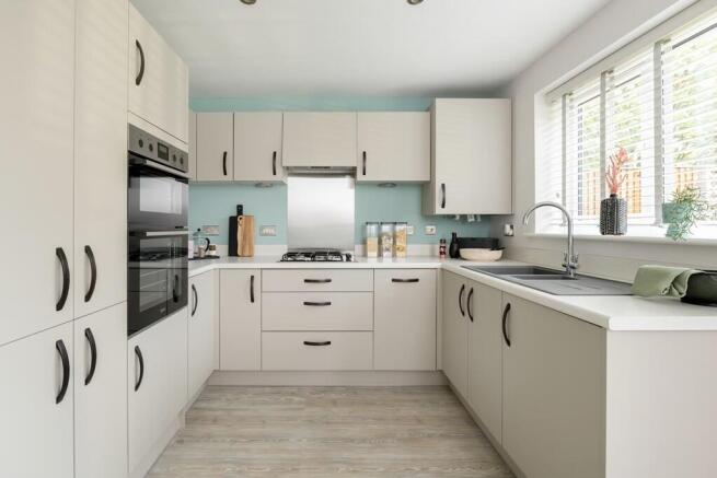 Contemporary fitted kitchen with lots of storage space