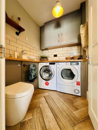 UTILITY ROOM & CLOAKROOM