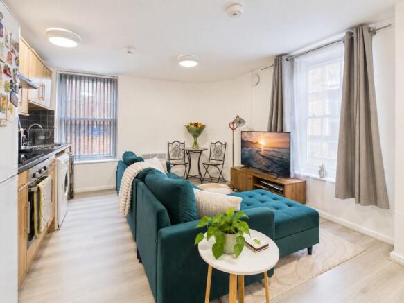 Bright Teal Sofa Open-Plan Interior