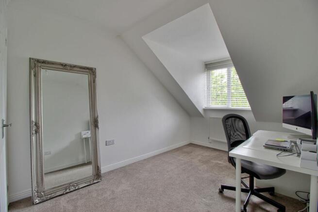 Bedroom Four with fitted wardrobes