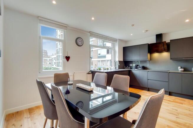 Bright modern kitchen with stylish dining area...