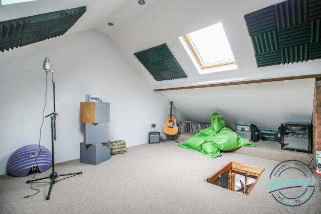 Insulated loft room with skylights, radiator and s