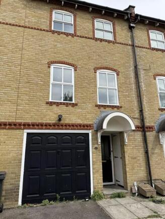 Charming terraced house with classic brick faca...