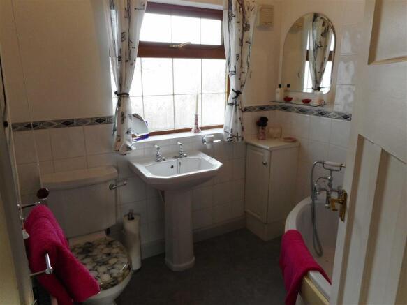 PART TILED FAMILY BATHROOM W/C
