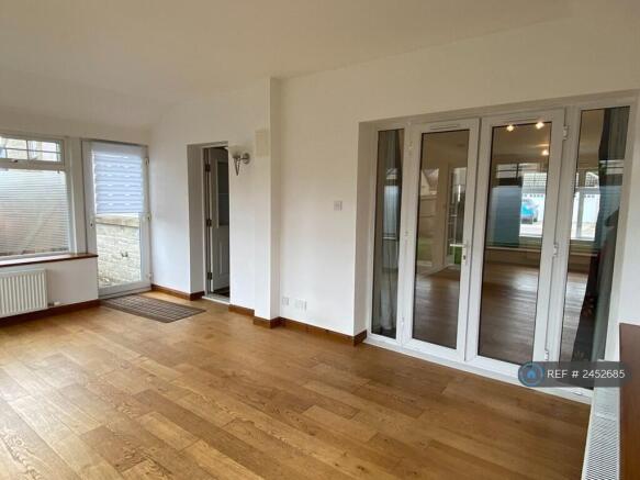 View Of Conservatory Showing Utility/Lounge Doors