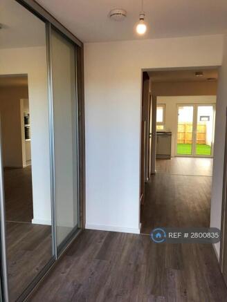 Entrance Hallway With Large Closet (Left)