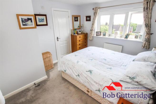 BEDROOM ONE (REAR)