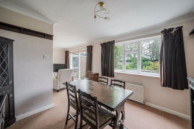 Open plan sitting room and dining room