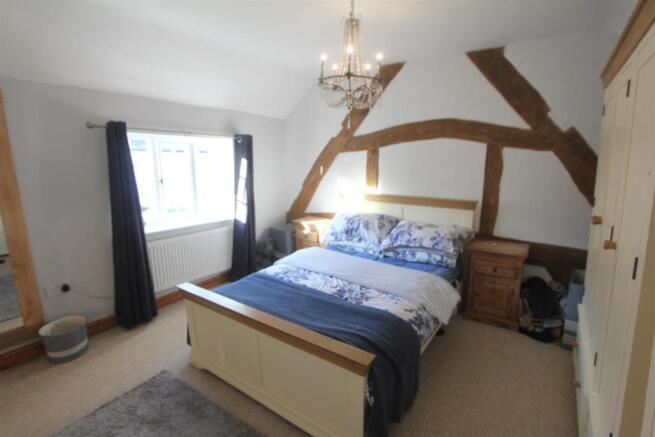 BEDROOM ONE TO FRONT