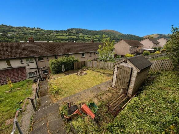 Spacious sunny garden with scenic hill views...