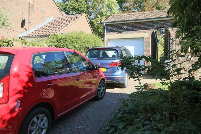 Parking for two cars & garage