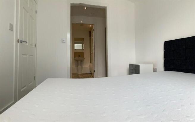 Bright, clean bedroom with built-in storage...