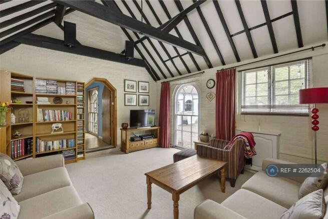 Bright Comfortable Lounge With Vaulted Ceiling