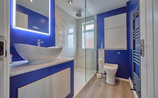 Refitted shower room to side