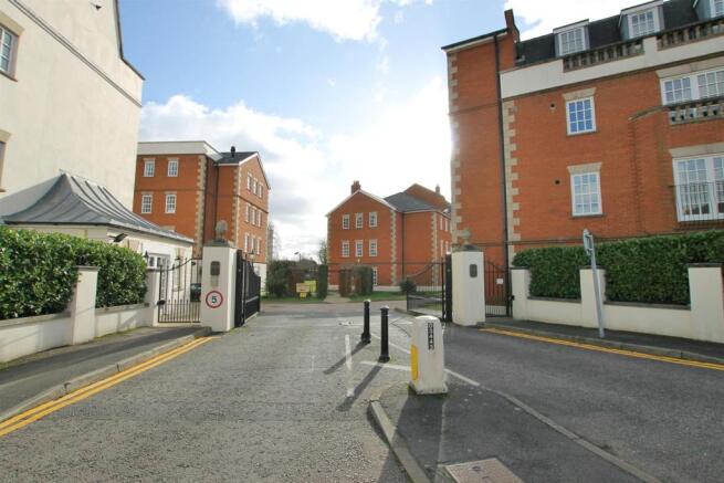 Gated entrance into Queens Reach.jpg
