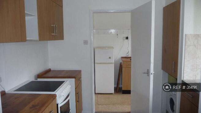 Kitchen With White Appliances