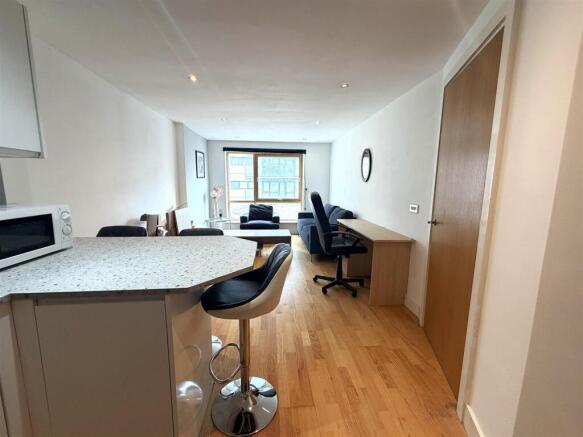 Modern open-plan living with breakfast bar...