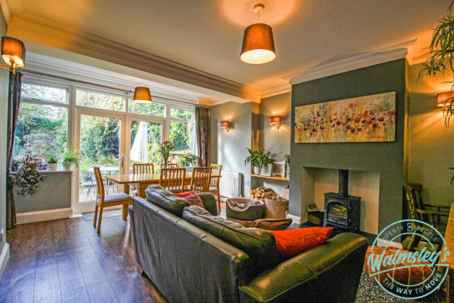 Sitting dining room with log burner
