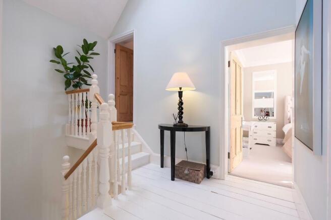 Bedroom 1; stairs to dressing room/Bed 4