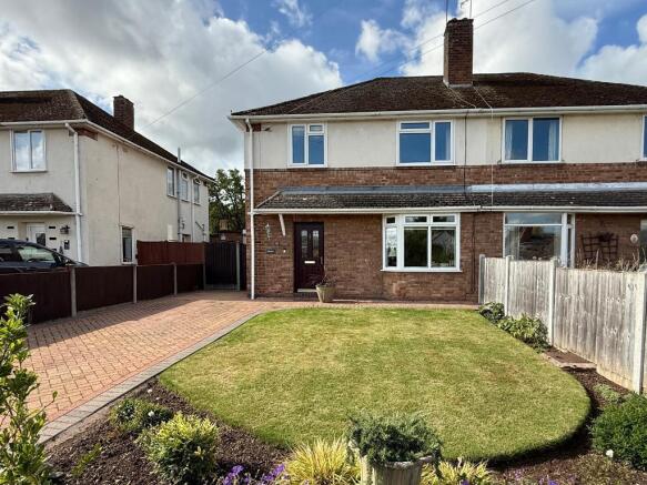 Front of house & side access to garden