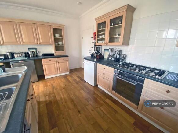 Kitchen Fully Fitted And Equipped With Dining Area