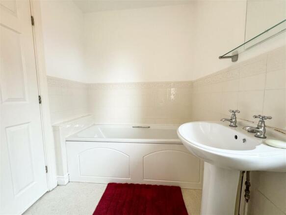 FAMILY BATH AND SHOWER ROOM