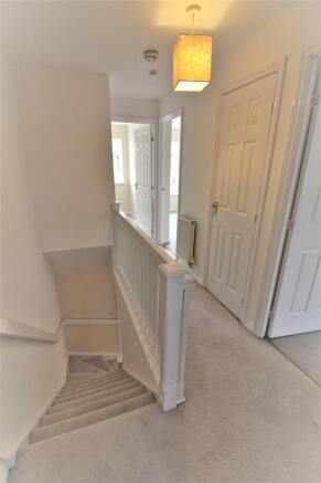 First Floor Landing With Storage Cupboard & Loft A