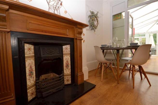 DINING AREA AND FIREPLACE