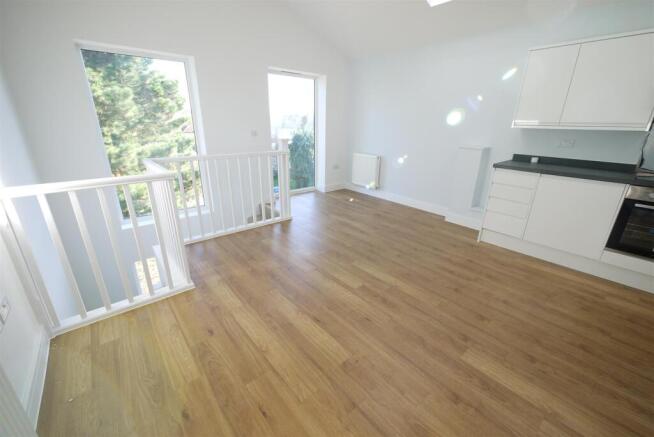 LIVING ROOM WITH OPEN PLAN KITCHEN