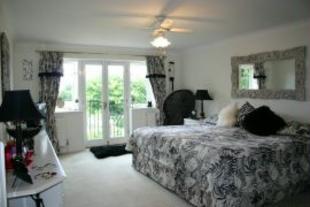 Principal Bedroom Su