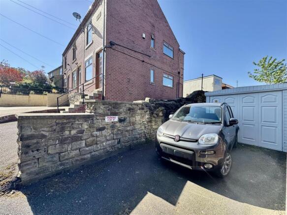 EXTERNAL FRONT, DRIVEWAYS AND GARAGE
