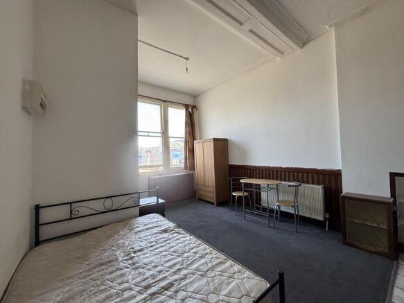 Spacious bedroom with ample natural light...