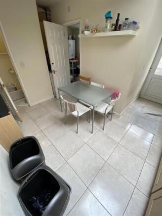 Bright kitchen with modern tiled floor...