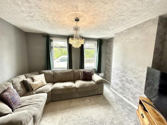 FRONT LIVING/SITTING AREA