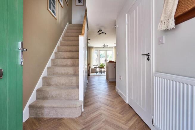 Spacious and bright hallway with views through to the garden