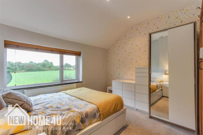 MASTER BEDROOM: