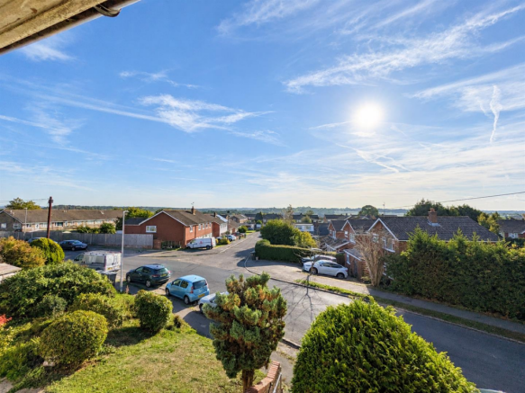 Sunny Suburban Street from Above.png