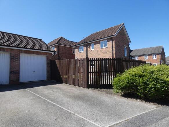 Driveway to Single Garage at the Rear