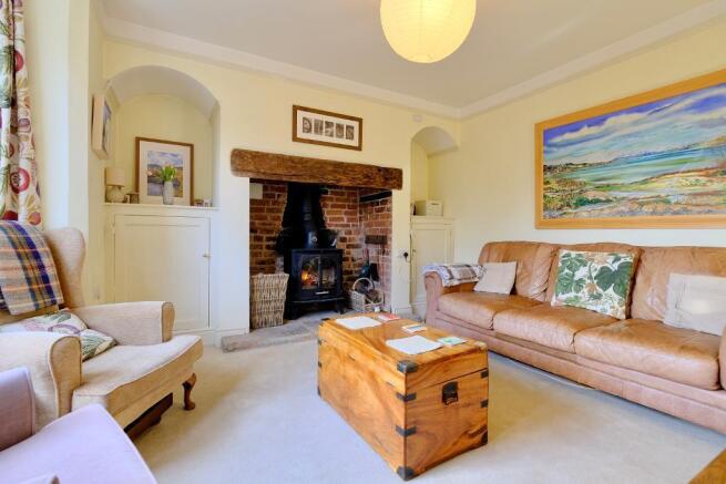 Sitting room with warming log burner