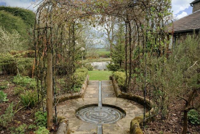 Mature gardens with many interesting features