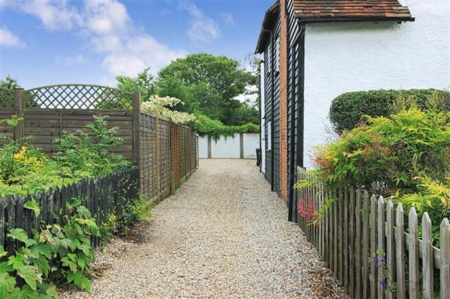 Sideway Leading To Garage