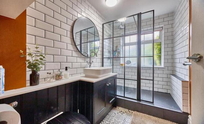 Refitted shower room to rear
