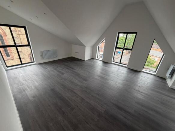Bright and spacious room with modern flooring t...