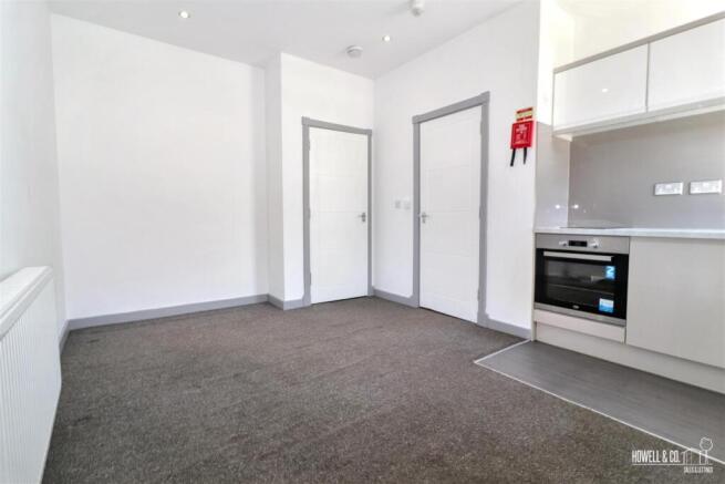 LIVING AND KITCHEN AREA