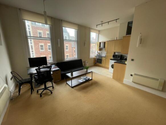 Bright open-plan living with large windows...