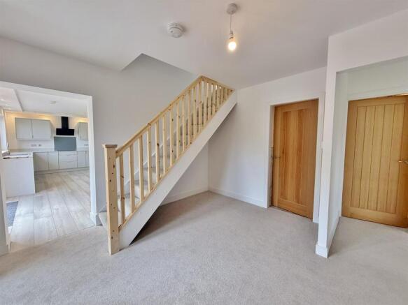 Entrance hallway to kitchen