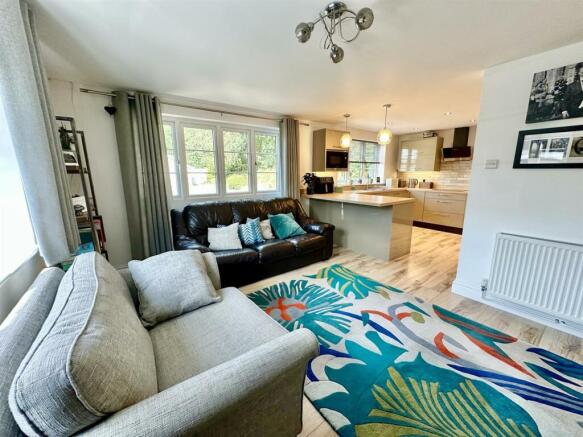 open plan lounge to kitchen.JPEG